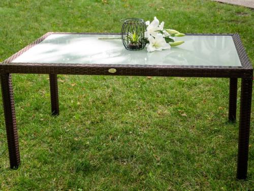 Przejdź do produktu Stół ogrodowy z technorattanu 150 x 90 cm AVVICENTE brąz 